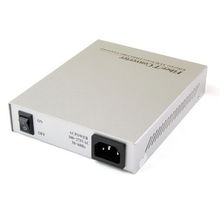 固网HT-9109SC 百兆多模插卡式光纤收发器与银色无线路由器的融合应用解析
